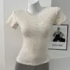 Fiori blu su sfondo albicocca - T-Shirt