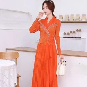 A Large Stretchable All-length Pleated Dress with a Slim Fit and a Belt a Large-sized Dress with Pleats and a Flattering Fit