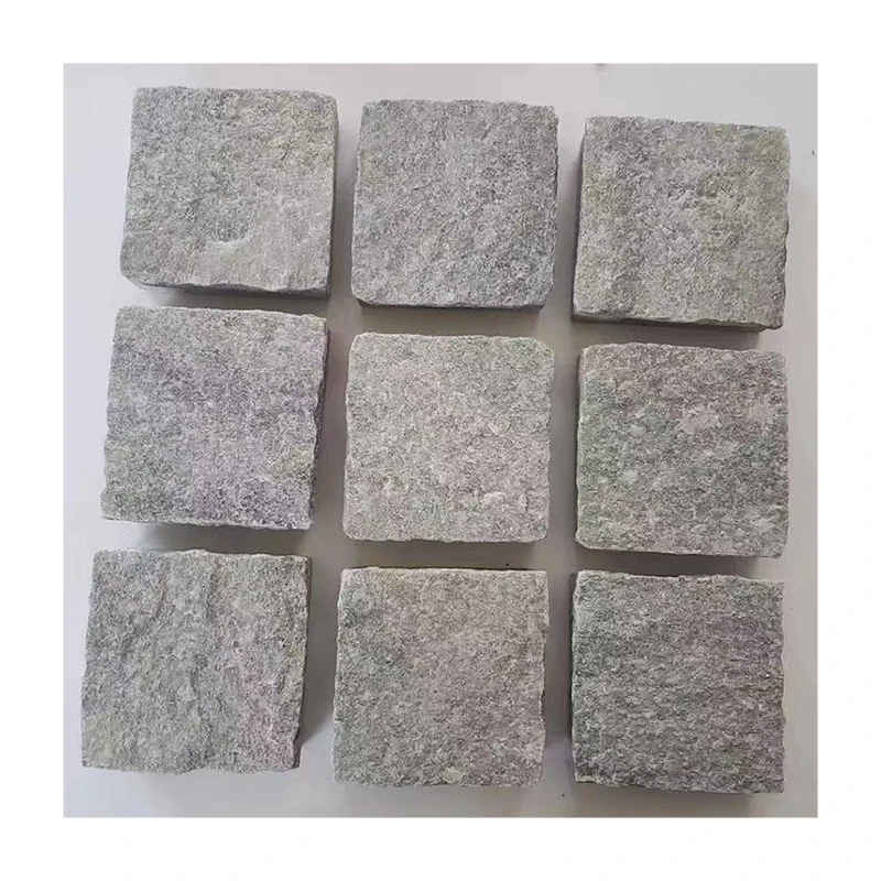 Qora bazalt toshdan tayyorlangan yo'l qoplamasi uchun toshlar. Qora paver toshlar. Tabiiy, ulg'aytirilgan, villalar va uy qurilmalari uchun pol plitalari