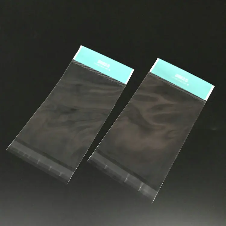 Bolsa de embalaje de plástico transparente Opp Autoadhesivas Bolsas Paquete de joyería de agujero de colgar Sello