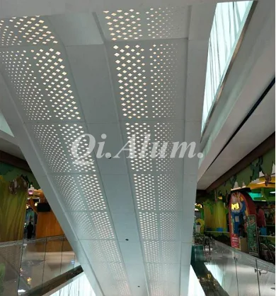 escalator capping with custom aluminum perforated panels