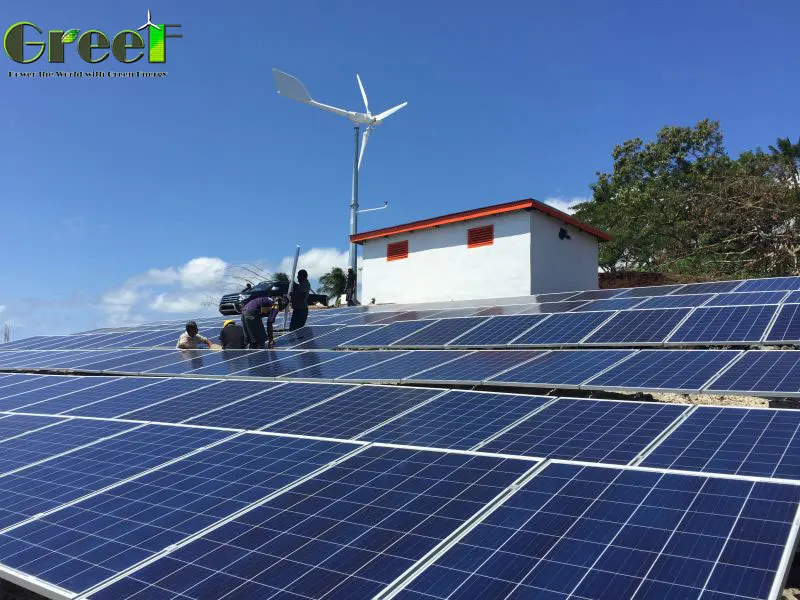 Image showcasing Charles building off grid in Belize, pouring the floor. - Facebook