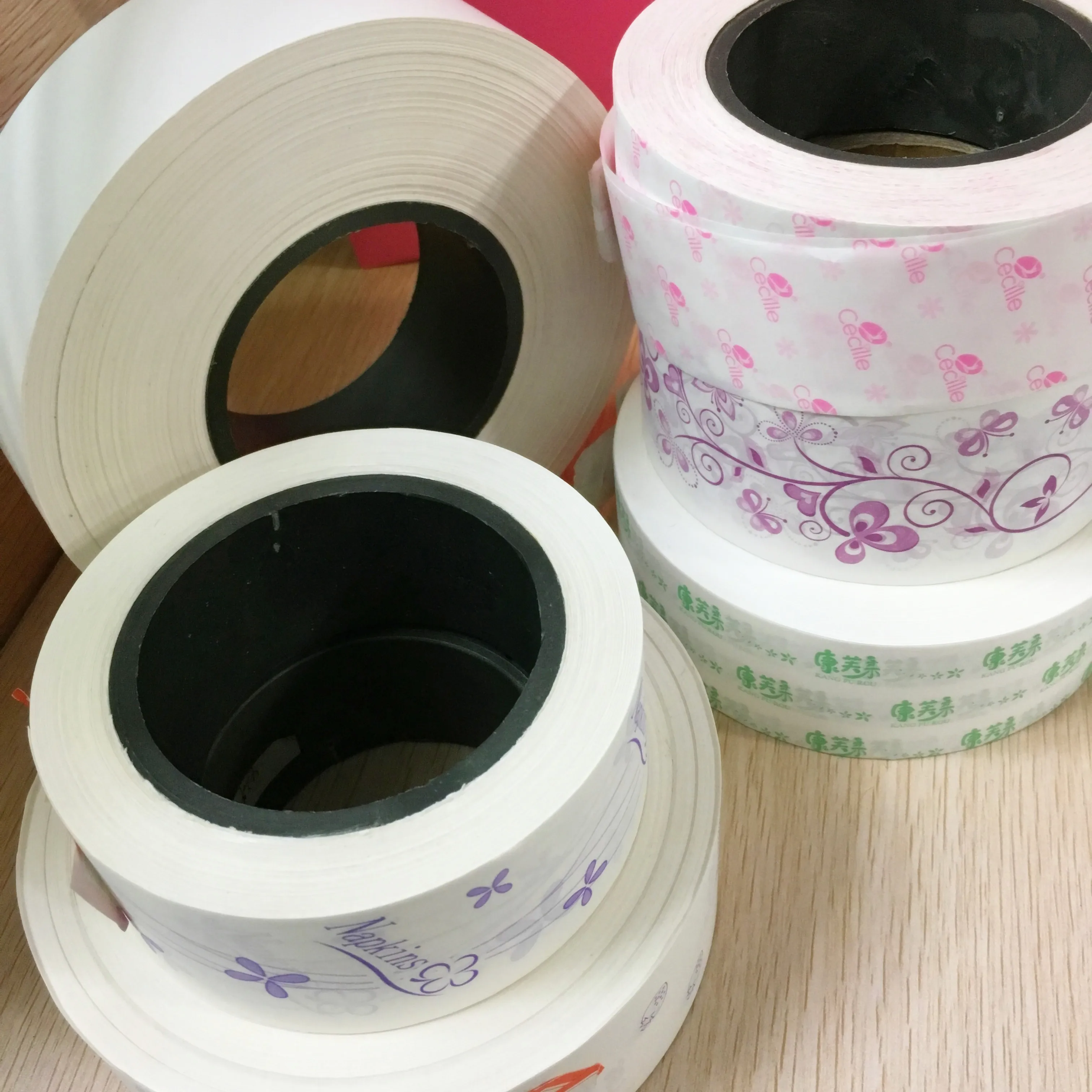 In Bulk Jumbo Roll Release Paper for Sanitary Towel Making Sanitary Pad Raw Material