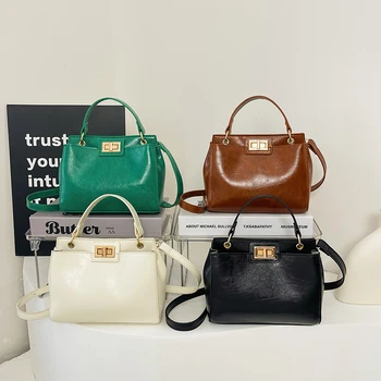 Manufacturers wholesale vintage leather handbags Women's 2024 Luxury locking shoulder tote