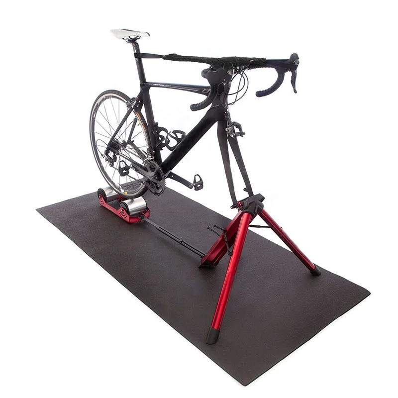 Feedback-Sports-Bike-Trainer-Floor-Mat-with-Omnium-and-bike.jpg