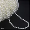 Un mètre de perles en fil de coton 5 mm (blanc cassé)