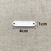 En blanco 10x40mm dos agujeros gran esquina redondeada