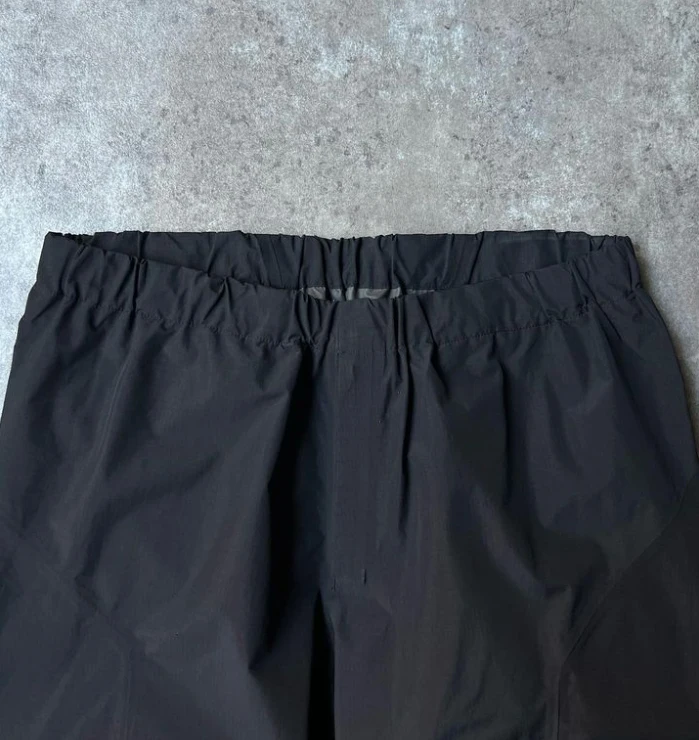 OEM Custom High Quality Man Black Loose Oversize Zipper Open Bottom Baggy Nylon Polyester Track Pants for Men supplier