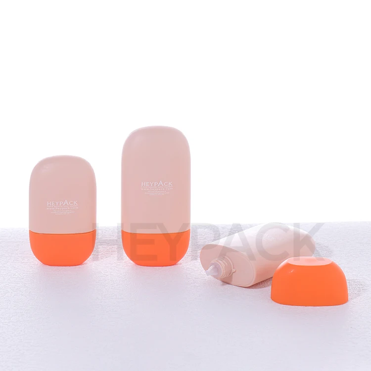 Flat Oval Shape 40ml HDPE Nozzle Applicator Sunscreen Lotion Bottle