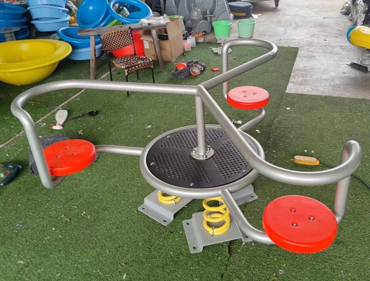 High-quality children's spring seesaw with safety guards, designed for outdoor playground equipment.