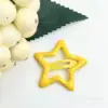Clip estrella con gota de aceite de color - 3.2cm amarillo intenso