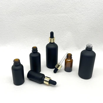 Hot sale Luxury 5ml 10ml 15ml 30ml 50ml 100ml Custom Empty Liquid Serum Bottles Matte Black Essential Oil Glass Dropper Bottle