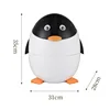 The penguin-shaped trash can is white.