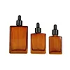 Brown bottle + black ring + rubber stopper + dropper