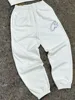 pantalones blancos