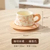 Tazas y platillos de café Camelia - naranja rosado