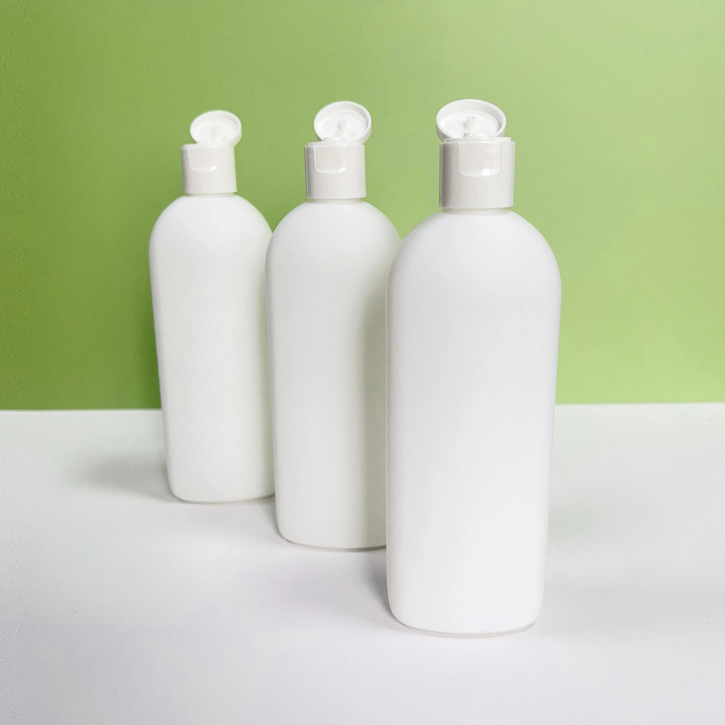 New Product 200ml HDPE Material Lotion Conditioner Body Milk Round Shoulder Flat Bottle