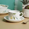 Tasse et soucoupe citron, boîte de couleur