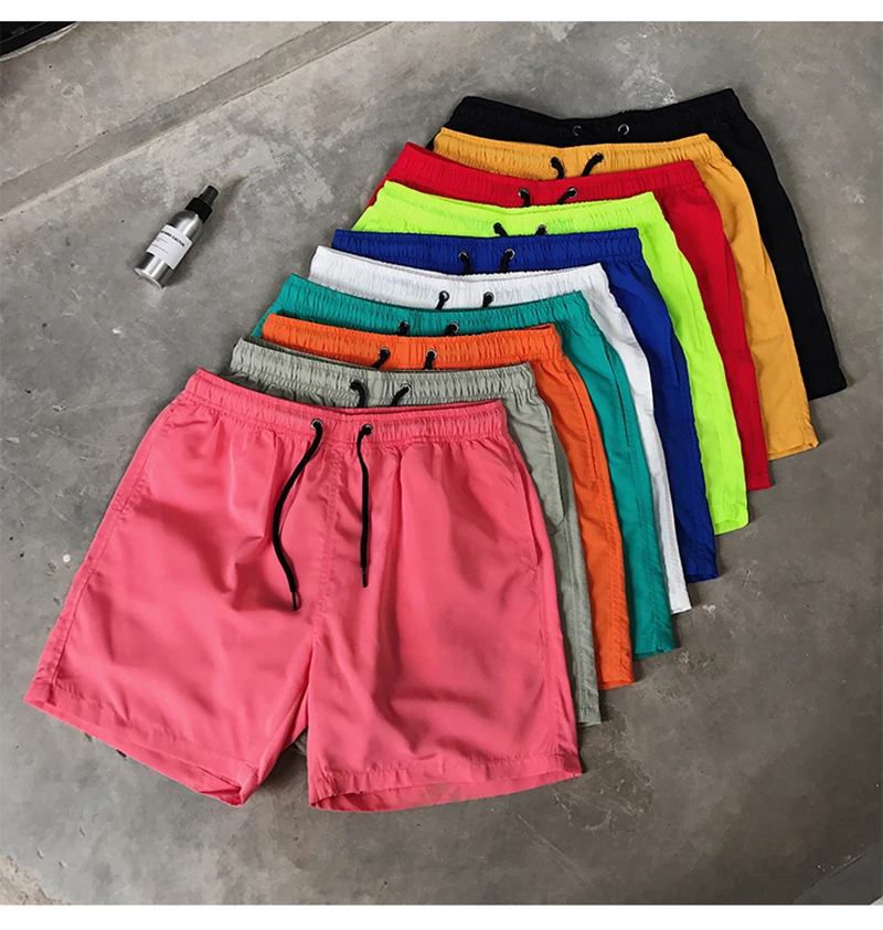 Pantaloncini da surf all'ingrosso Pantaloncini casual da spiaggia da uomo personalizzati Capispalla di moda Costume da surf allentato impermeabile484_voghion.com