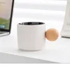 White coffee cup with wood holder