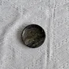 Diámetro 10, altura 2 cm, mármol verde lluvia.