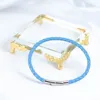 Chiusura in argento + vera pelle di pecora blu