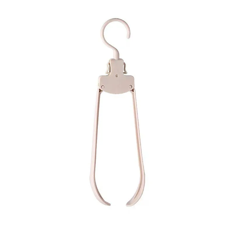 Travel folding hanger Multi-functional storage hanger Wide shoulder no trace non-slip hanger factory