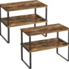 Tablero de madera quemada con patas negras.