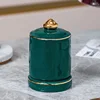 Gold-edged peacock green toothpick holder
