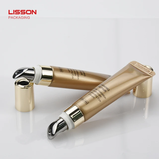 Custom 10ml 15ml Empty Metal Eye Cream Serum Container Cosmetic PE Soft Tube Packaging With Zinc Alloy Massage Applicator