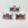 09#: papillon con diamanti rosa