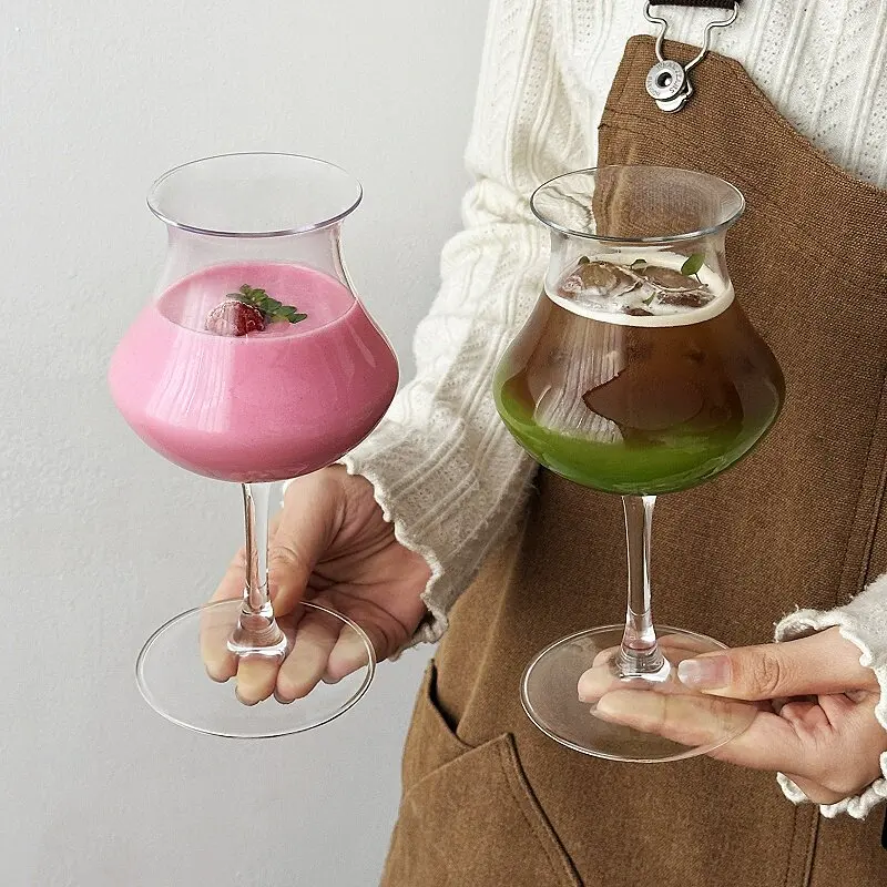 Stemmed cocktail glasses with rounded bowls and flared rims