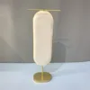 Présentoir à colliers beige