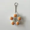 Pineapple bun rotating button keychain