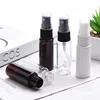 clear bottle with black sprayer