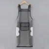 Black, extra long style with pockets for wiping hands.