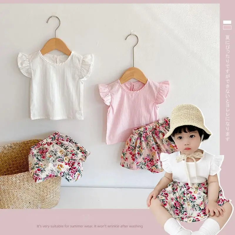 Хит продаж, весенне-летний новый комплект для маленьких девочек с юбкой с принтом, хлопковая рубашка с летающими рукавами, костюм из 2 предметов
