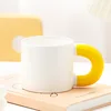 Matte white and yellow handle