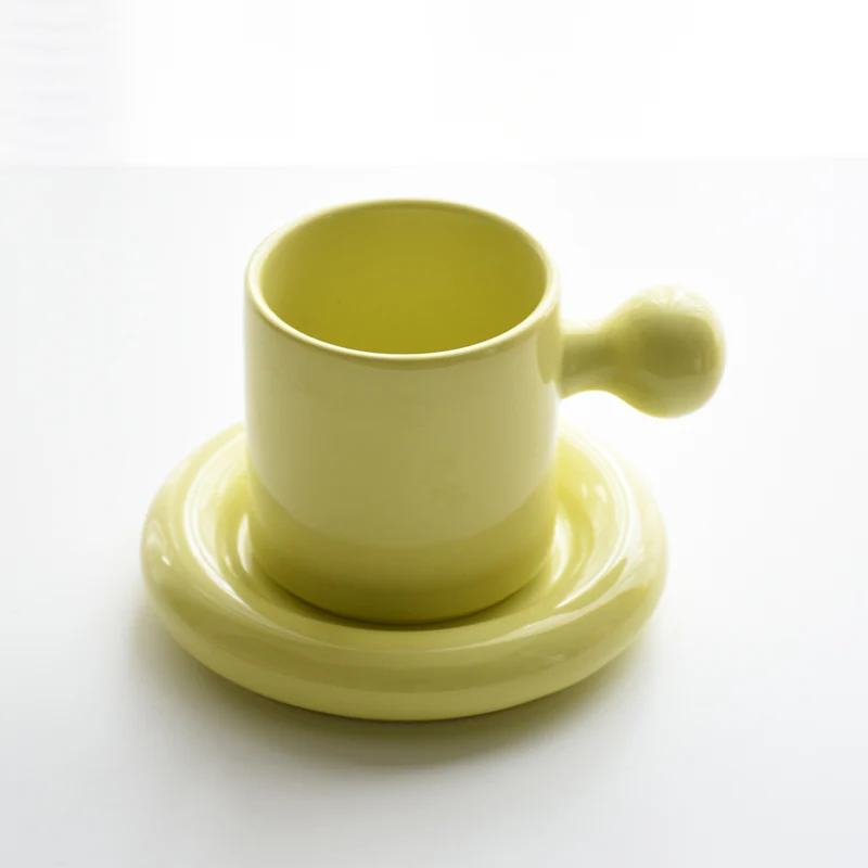 2022 Cheap Creative Design Beauty Colors Cute Egg Yolk Ceramic Cup with Stainless Steel Saucer Coffee Cup and Saucer