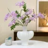 Two large white textured bottles in light purple