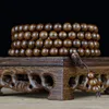 legno di sandalo lucido dorato
