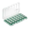 28-compartment pillbox [transparent green English label]