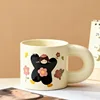 Girl in black, chubby cup