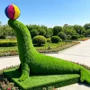 Lion de mer vert avec boule colorée, topiaire artificielle