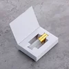 Rociador de oro con caja blanca
