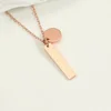 Long medal necklace in rose gold