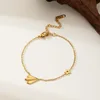 Pulsera avión papel oro