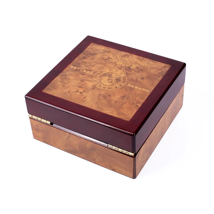 Dark - red - brown box with gold details