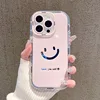 Étui miroir rose crémeux avec motif smiley de guérison.
