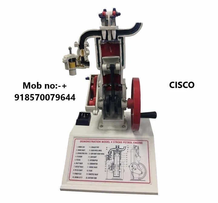 Четырехтактная модель бензинового двигателя из алюминиевого сплава установленная на базе с напечатанными диаграммами объясняющими работу